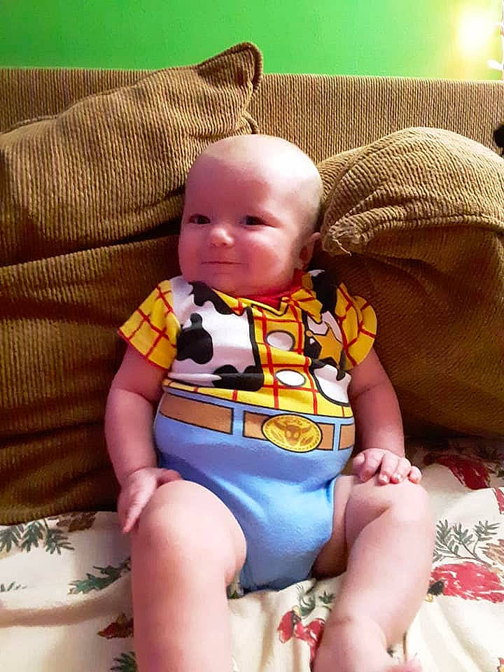 Weylin joined the competition — help win amazing prizes! baby, baby_toddler_clothing, chair, cheek, child, comfort, couch, foot, head, human_body, human_leg, knee, lap, leg, pattern, person, sitting, skin, sleeve, thigh