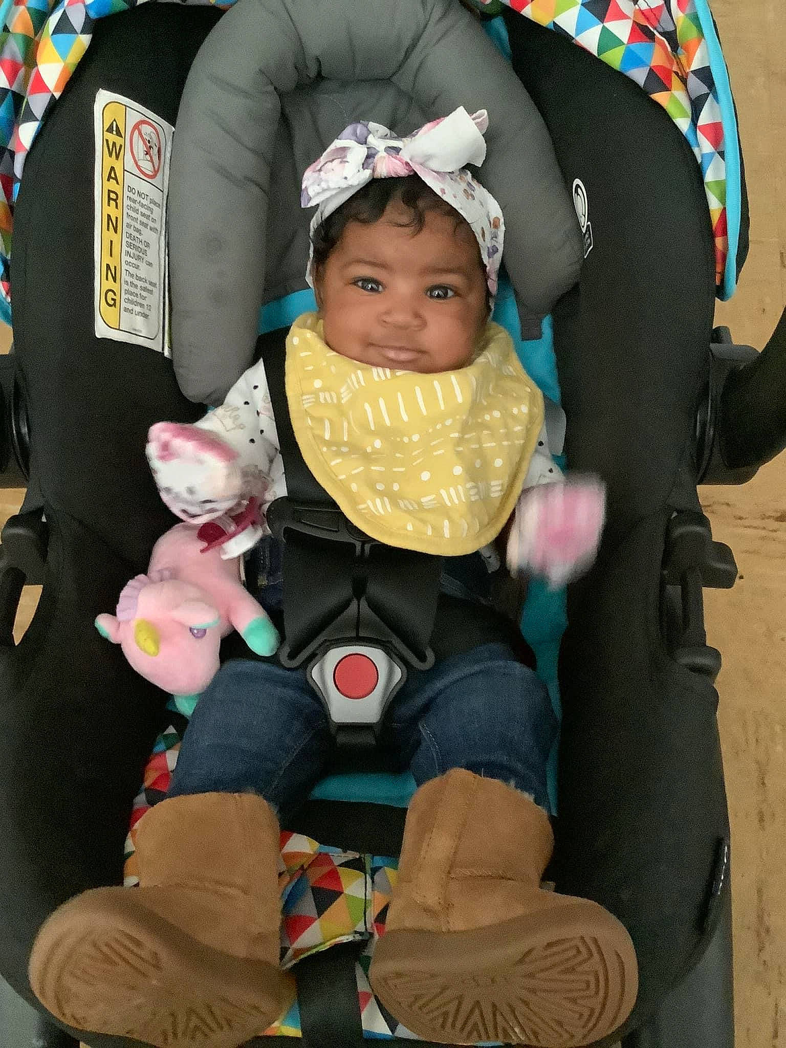 Dalylah joined the competition — help win amazing prizes! baby, baby_carriage, baby_products, baby_safety, baby_toddler_clothing, boot, car_seat, cheek, child, comfort, fun, head, headwear, lap, person, sitting, skin, sock, toddler, vacation