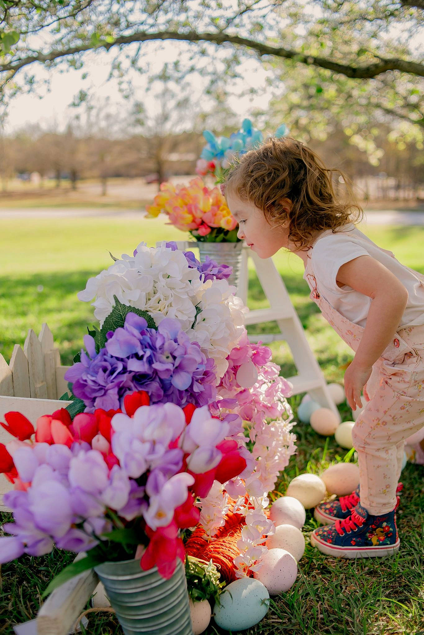 Kalani is registered to the contest to win money with this photo: annual_plant, botany, bouquet, cut_flowers, event, floral_design, floristry, flower, flower_arranging, grass, happy, magenta, people_in_nature, person, petal, pink, plant, recreation, shorts, toddler