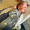newborn, baby, sleeping, hospital, medical_tube, onesie, blanket, bottle, hand, infant, person, bed, care, healthcare, cute, rest, pediatric, soft, comfort, child