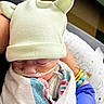 Phoenix joined the competition — help win amazing prizes! newborn, baby, hospital, blanket, hat, ears, sleeping, medical_tube, gloved_hand, arm, person, cute, resting, child, infant, care, health, wrapped, soft, tender