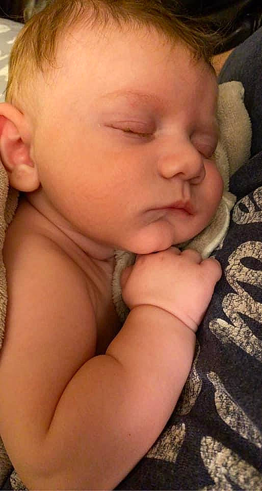 Paxten is registered to the contest to win money with this photo: baby, cheek, comfort, ear, eye, eyebrow, eyelash, finger, forehead, gesture, hair, hand, head, human_body, iris, lip, mouth, neck, nose, person