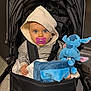 Aylonn a rejoint le concours — aidez-le/la à gagner de superbes lots ! baby, pacifier, stroller, hood, striped_clothing, plush_toy, blue_toy, child, indoor, curious, seated, blanket, infant, cute, young_child, face, portrait, hand, soft_toy, cozy