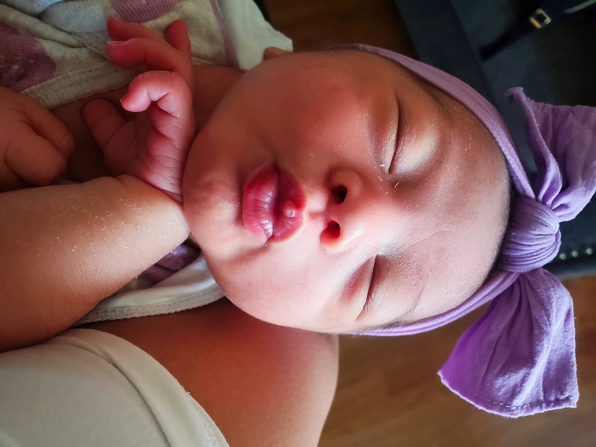 Maliyah is registered to the contest to win money with this photo: baby, cheek, chin, comfort, ear, eyebrow, eyelash, facial_expression, gesture, hand, headwear, human_body, iris, jaw, lip, mouth, neck, nose, person, product