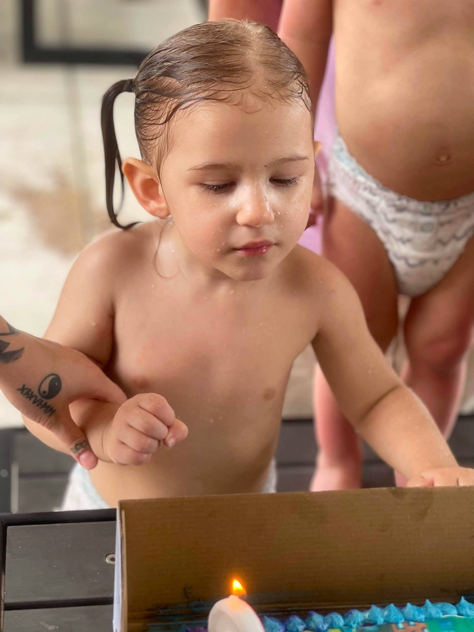 Aspyn is registered to the contest to win money with this photo: abdomen, baby, barechested, bathing, candle, cheek, chest, child, eyelash, finger, fun, hand, happy, muscle, organ, person, photograph, shoulder, skin, toddler