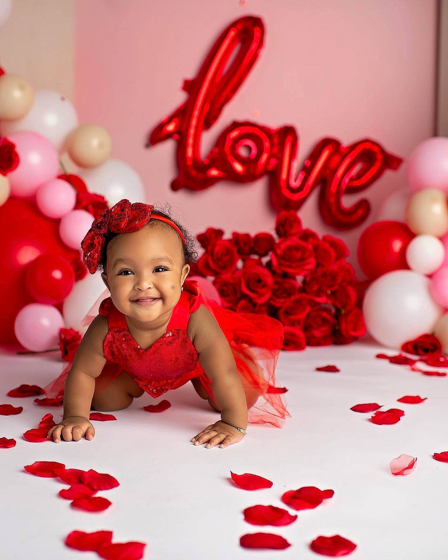 Kalani is registered to the contest to win money with this photo: baby, baby_toddler_clothing, balloon, beauty, carmine, cut_flowers, design, event, flooring, font, happy, heart, joy, magenta, pattern, person, petal, pink, red, smile