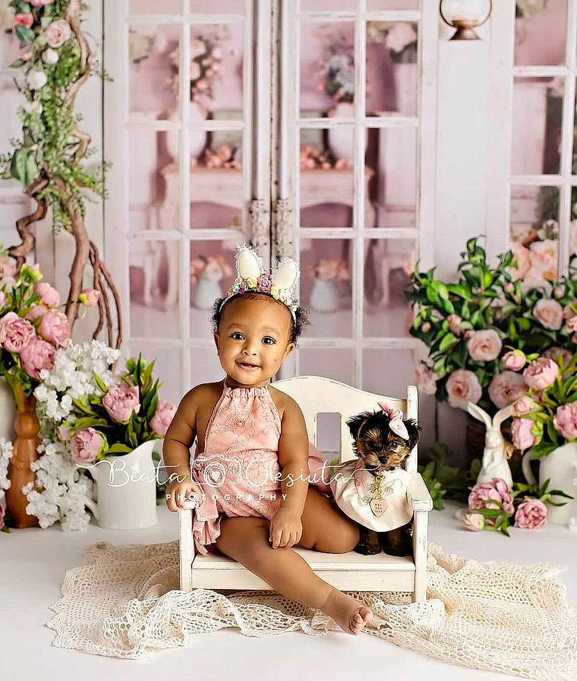 Kalani is registered to the contest to win money with this photo: baby, bouquet, chair, child, cut_flowers, dress, event, floristry, flower, flower_arranging, happy, joy, peach, person, petal, pink, plant, smile, tableware, textile
