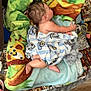 Jaxon is registered to the contest to win money with this photo: baby, blanket, fleece, toy, floor, quilt, sleeping, child, infant, soft_toy, animal_print, striped_blanket, wooden_floor, cozy, indoors, resting, cute, comfort, wrapped, peaceful