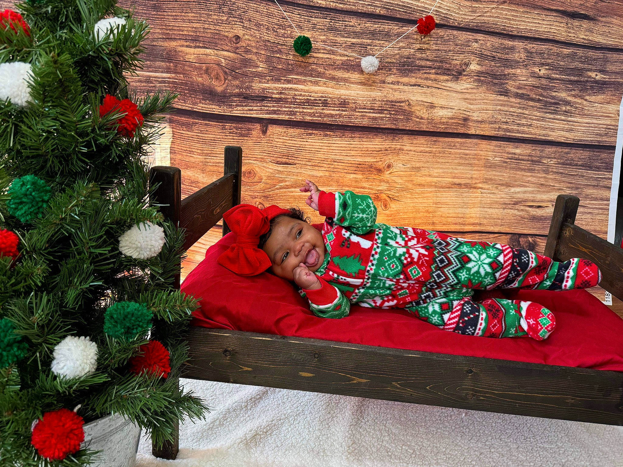 Mydaisha is registered to the contest to win money with this photo: christmas, christmas_decoration, christmas_eve, christmas_ornament, christmas_tree, conifer, decoration, event, evergreen, grass, green, headwear, holiday, holiday_ornament, leisure, ornament, person, plant, red, room