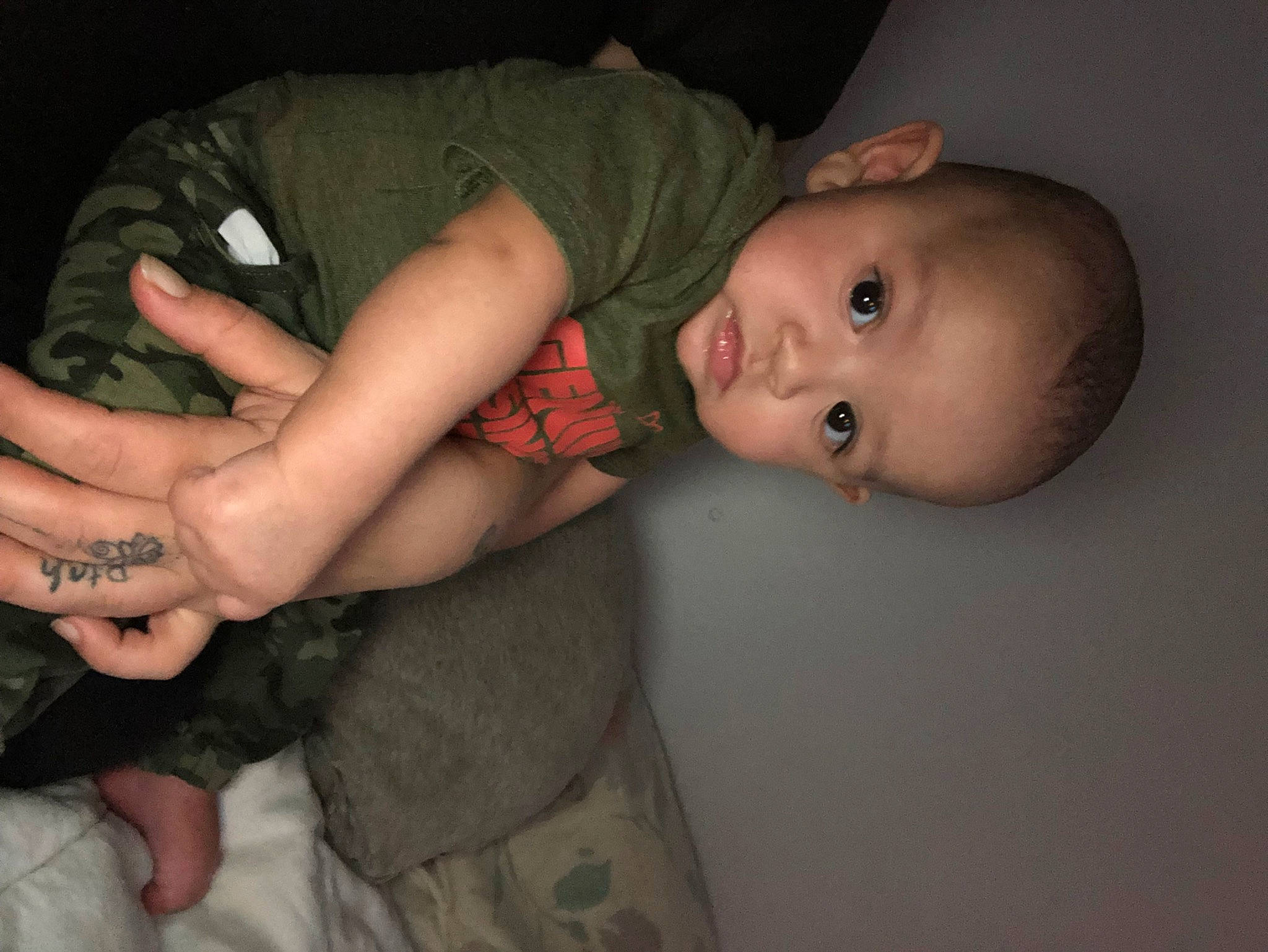 Dominick is registered to the contest to win money with this photo: baby, baby_toddler_clothing, cheek, comfort, elbow, eye, finger, flash_photography, gesture, hand, human_body, iris, leg, mouth, nose, person, skin, sleeve, thumb, toddler