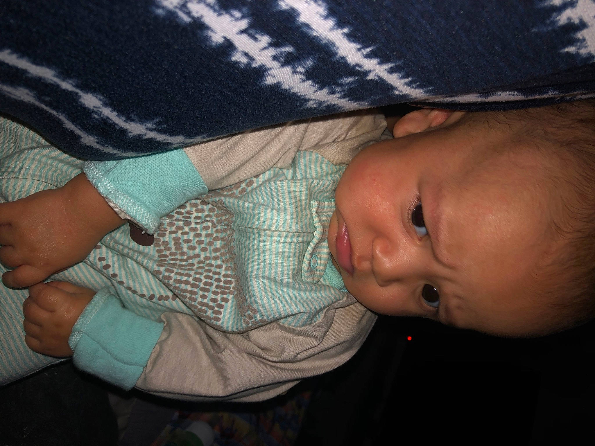 Dominick is registered to the contest to win money with this photo: arm, baby, baby_products, baby_toddler_clothing, cheek, child, comfort, finger, gesture, hand, lip, nail, nose, pattern, person, skin, sleeve, thumb, toddler, tree