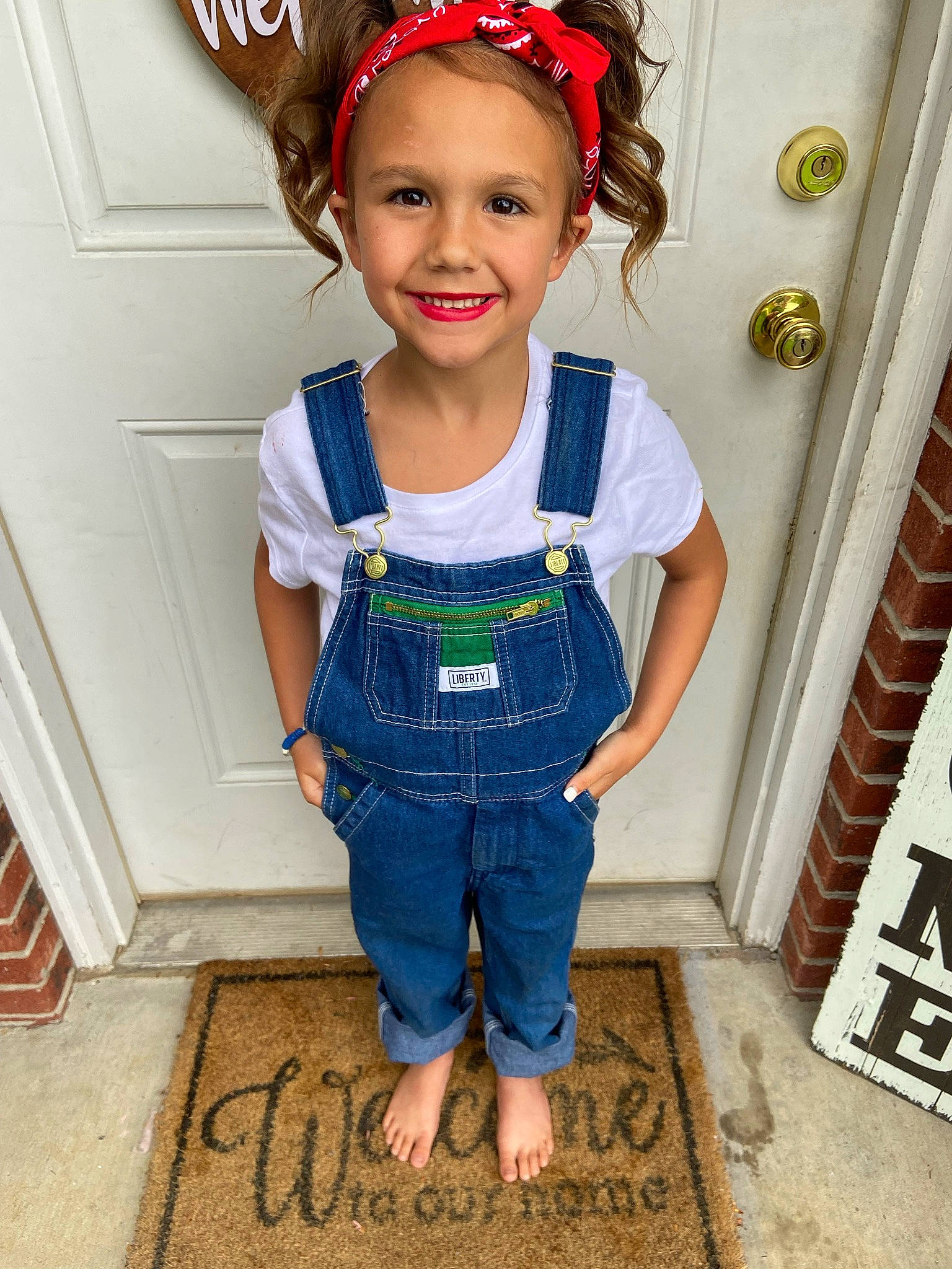 Baylee is registered to the contest to win money with this photo: arm, baby_toddler_clothing, child, costume_hat, denim, electric_blue, face, fashion_accessory, happy, headband, jeans, jewellery, joy, pattern, person, sleeve, smile, standing, t_shirt, toddler