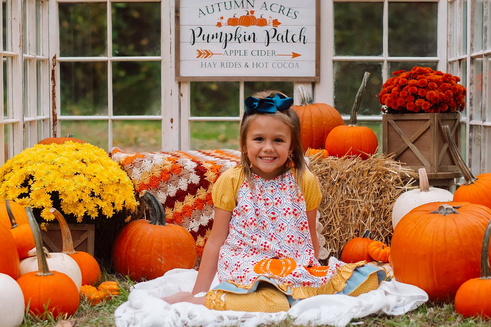 Baylee joined the competition — help win amazing prizes! _and_melon_family, _gourd, calabaza, cucumber, cucurbita, door, flower, gourd, grass, happy, joy, local_food, natural_foods, orange, people_in_nature, person, plant, pumpkin, smile, squash