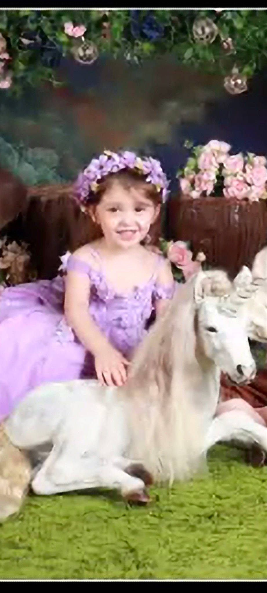 Ember is registered to the contest to win money with this photo: child, dress, event, face, flower, fun, grass, happy, headpiece, horse, iris, joy, pack_animal, person, petal, photograph, pink, plant, smile, toddler