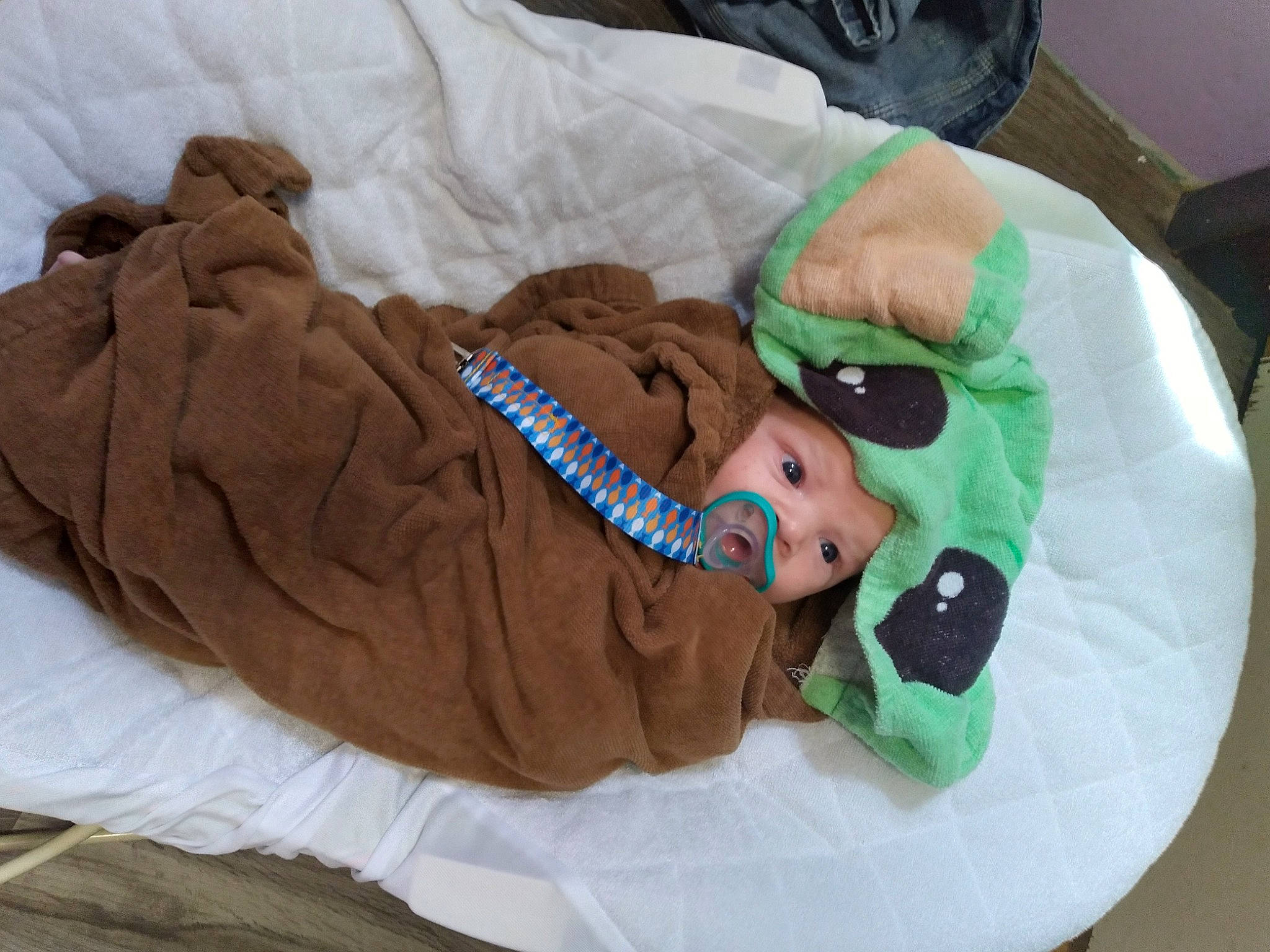 Kolton is registered to the contest to win money with this photo: baby, child, comfort, elbow, event, fun, headwear, hospital, linens, medical, person, personal_protective_equipment, room, sleeve, wrist