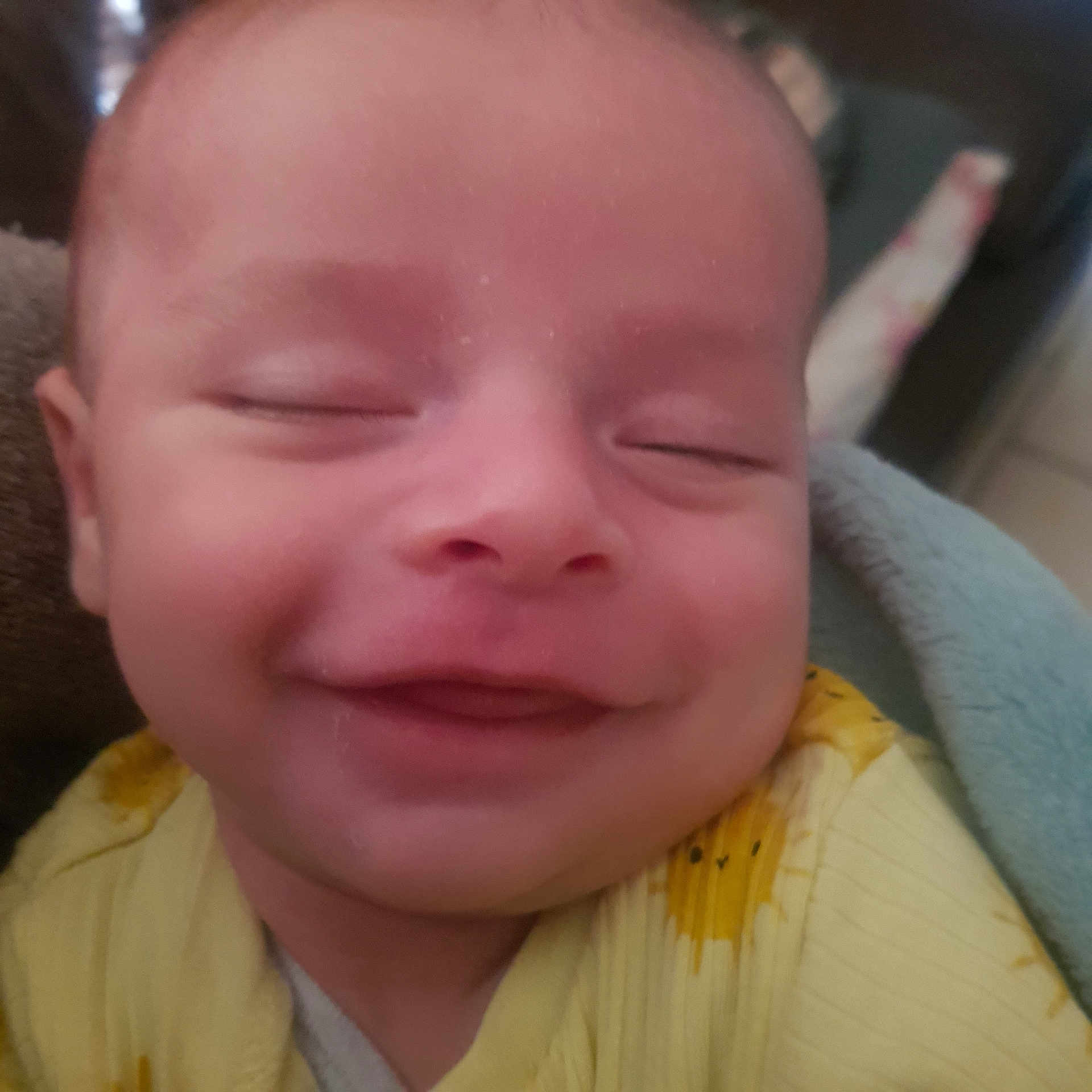 Nahil participe au concours pour gagner de l'argent avec cette photo : baby, smile, face, closeup, infant, yellow_clothing, blanket, sleepy, happy, child, soft_texture, cute, portrait, wrapped, newborn, toddler, peaceful, indoors, skin, expression