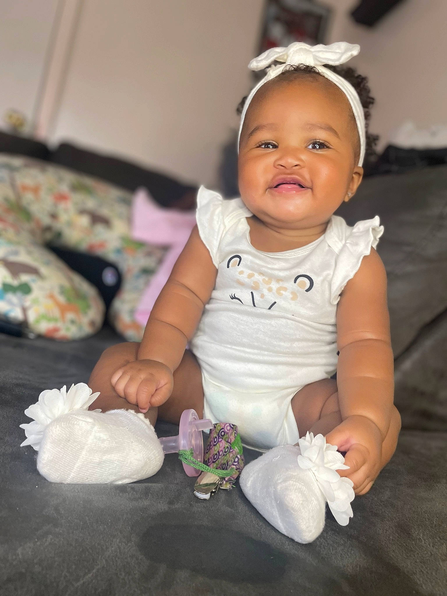 Stormi joined the competition — help win amazing prizes! baby, baby_toddler_clothing, cheek, child, comfort, dress, face, fashion_accessory, finger, flash_photography, flooring, happy, hat, head, iris, person, room, sitting, skin, sleeve