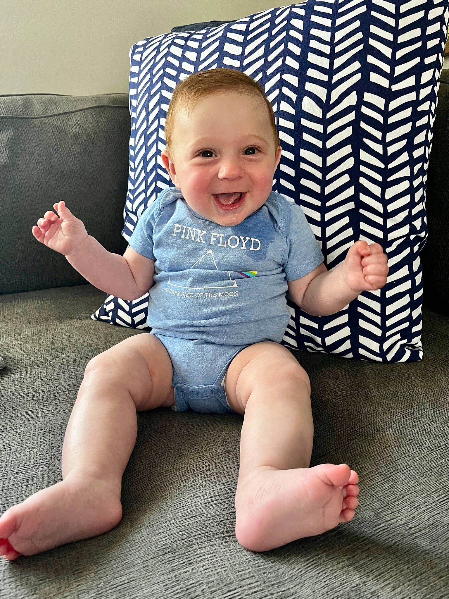 Levi joined the competition — help win amazing prizes! arm, baby, baby_toddler_clothing, barefoot, cheek, comfort, eye, face, facial_expression, finger, foot, happy, head, iris, joy, knee, person, skin, sleeve, smile