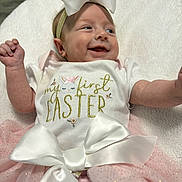 Novalynn is registered to the contest to win money with this photo: baby, child, smiling, easter, bow, headband, pink, tutu, white, clothing, cute, portrait, infant, celebration, soft, cushion, happy, fun, holiday, person