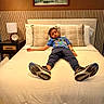 Joseph joined the competition — help win amazing prizes! bed, bedroom, blanket, child, clock, cozy, furniture, headboard, home, indoor, lamp, nightstand, painting, pajamas, pillows, portrait, relaxed, resting, sleeping, sneakers