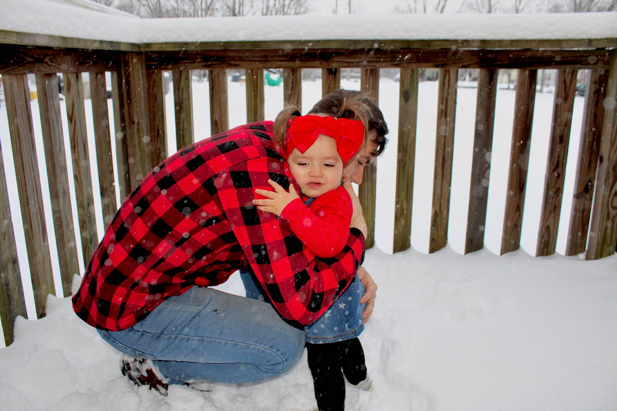 Dezirae is registered to the contest to win money with this photo: boot, event, fence, freezing, fun, headwear, human_body, jeans, leisure, mammal, pattern, person, plaid, playing_in_the_snow, precipitation, recreation, snow, street_fashion, sunglasses, tartan