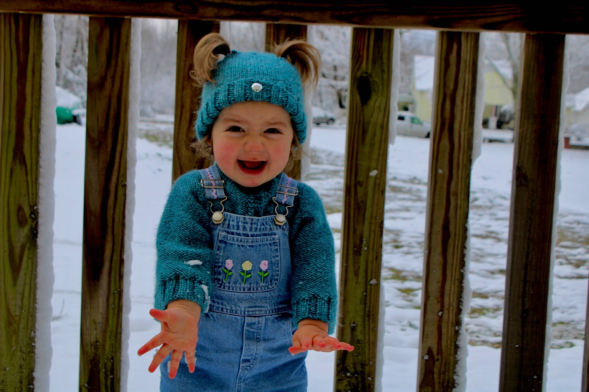Dezirae is registered to the contest to win money with this photo: baby_toddler_clothing, cap, child, eye, facial_expression, freezing, fun, happy, headgear, headwear, leisure, outdoor_play_equipment, outerwear, person, recreation, sleeve, smile, snow, street_fashion, swing