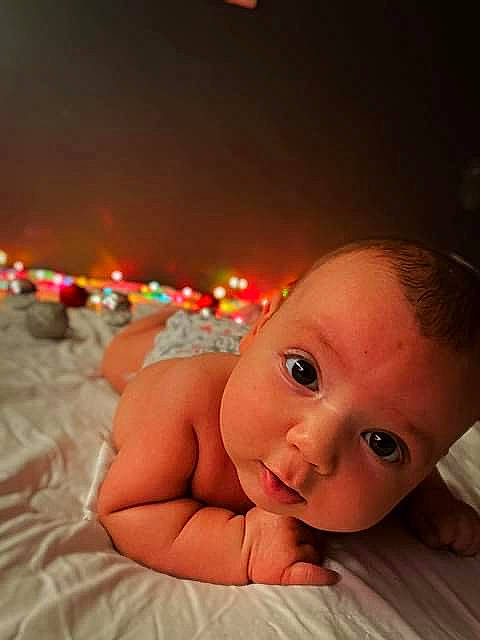 Dezirae is registered to the contest to win money with this photo: baby, cheek, child, close_up, eye, face, finger, hand, head, human, iris, lip, mouth, nose, organ, person, photography, skin, smile, toddler