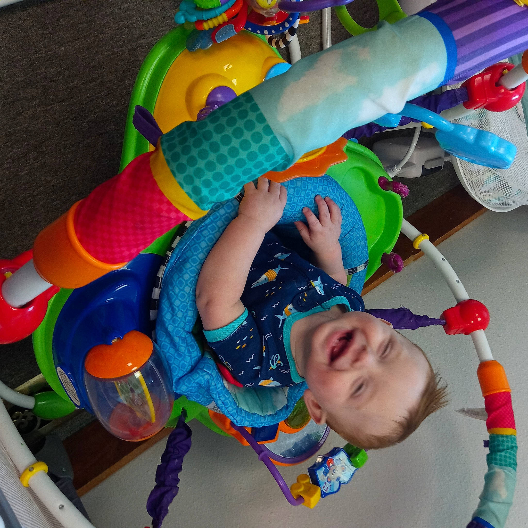 Levi is registered to the contest to win money with this photo: baby, baby_products, baby_toddler_clothing, baby_toys, balloon, child, fun, happy, human_leg, joy, leisure, party_supply, pattern, person, plastic, play, recreation, smile, thigh, toddler