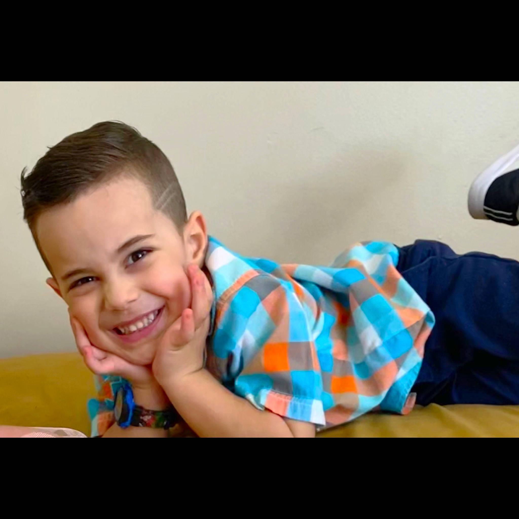 Bernardo joined the competition — help win amazing prizes! brown_hair, comfort, electric_blue, eyelash, eyewear, flash_photography, fun, gadget, hair, happy, joy, mouth, neck, pattern, person, plaid, sitting, sleeve, smile, t_shirt