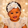 baby, smiling, girl, headband, pearl, crystals, dress, lace, portrait, cute, happy, child, closeup, jewelry, earrings, curly_hair, fashion, face, celebration, studio