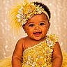 Maci joined the competition — help win amazing prizes! baby, child, dress, yellow, feather, headband, flower, smile, portrait, cute, adorable, happy, celebration, tutu, jewels, infant, fashion, sparkle, studio, glamorous