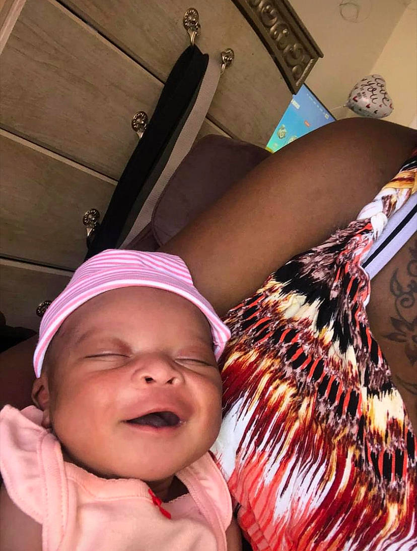 Jaylani is registered to the contest to win money with this photo: beauty, comfort, cool, elbow, eye, finger, hand, happy, headgear, headwear, human_body, leg, light, mouth, organ, person, pink, skin, textile, thigh