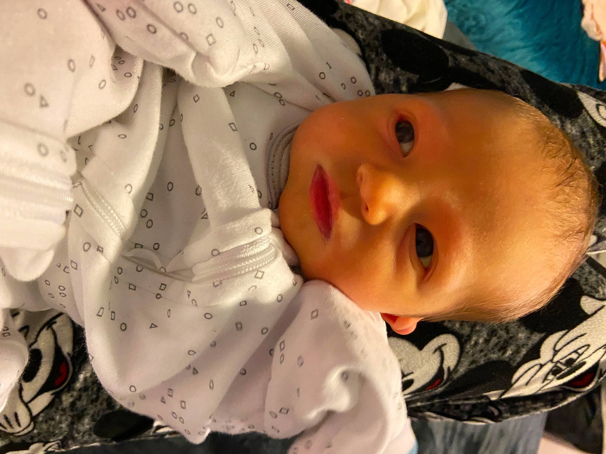 Alistair is registered to the contest to win money with this photo: baby, baby_products, baby_toddler_clothing, cheek, child, chin, comfort, eyebrow, eyelash, happy, iris, lip, mouth, nose, pattern, person, portrait_photography, skin, sleeve, textile