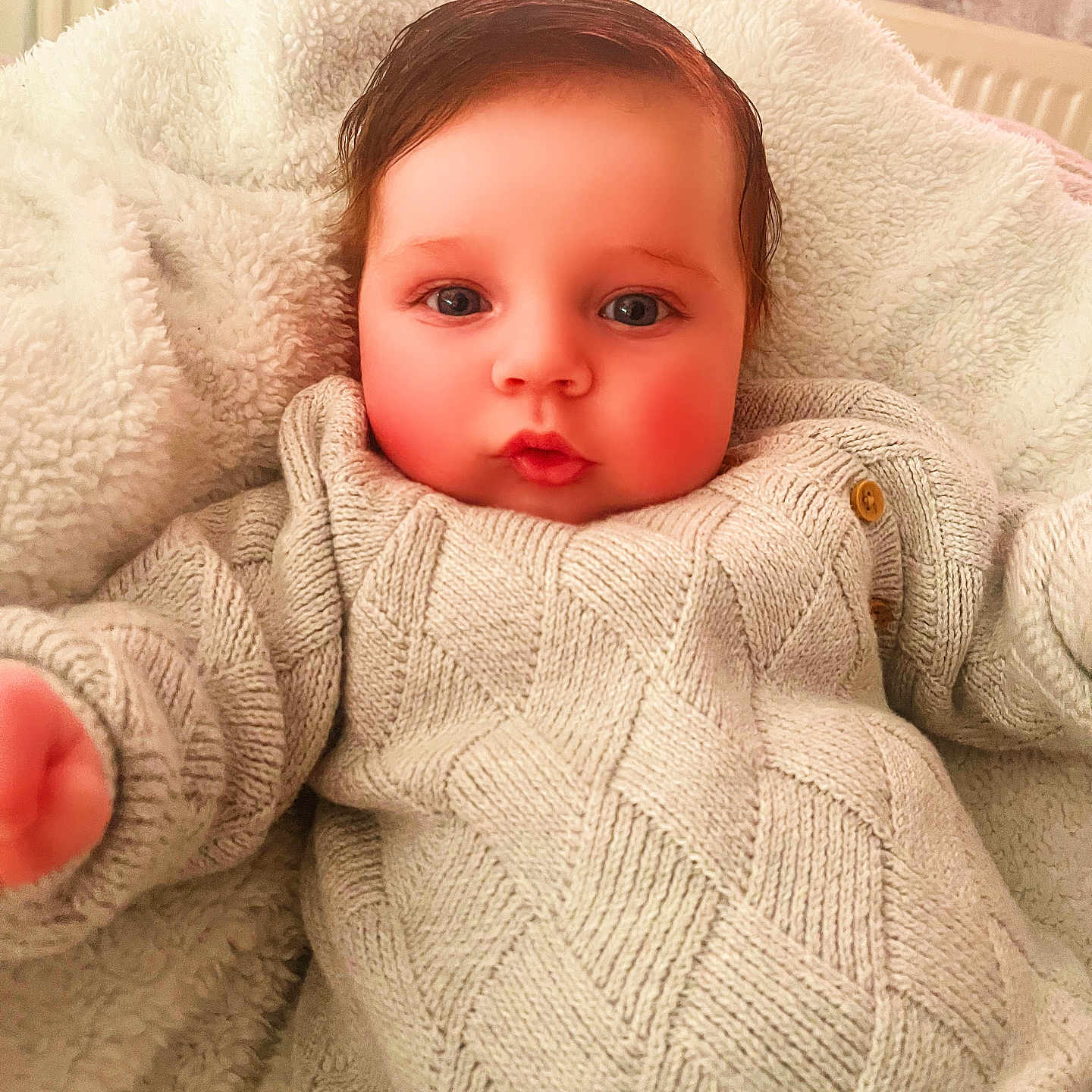Arlo joined the competition — help win amazing prizes! baby, blanket, clothing, face, head, knitwear, newborn, person, photography, portrait, quilt, sweater, sweatshirt, towel, toy, wool