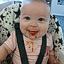 baby, high_chair, food_mess, smiling, face, child, straps, clothing, indoor, seat, star_pattern, happy, infant, tongue_out, messy, cute, person, young_child, casual, portrait