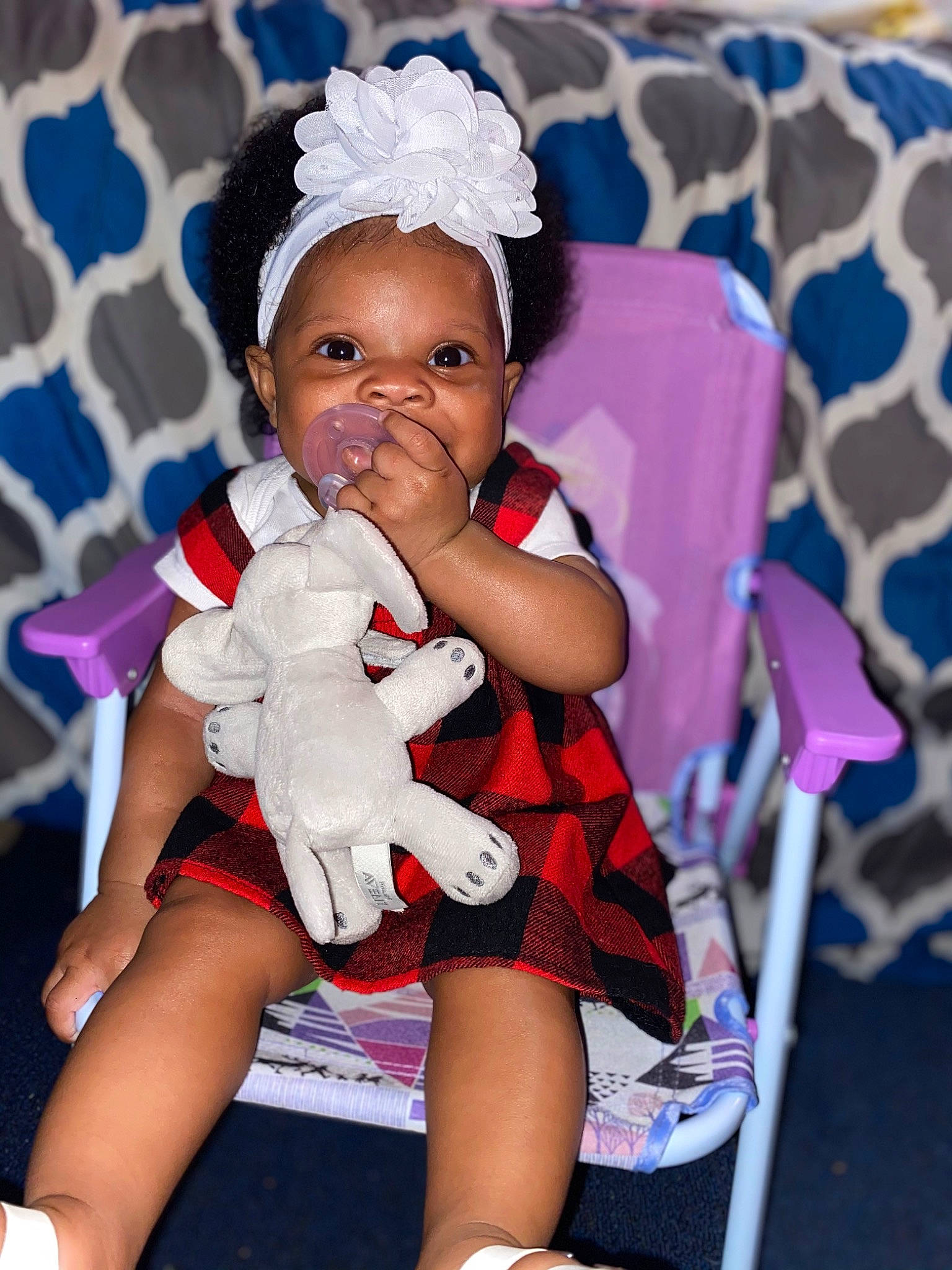 Annaliese joined the competition — help win amazing prizes! baby_toddler_clothing, blue, child, event, facial_expression, fun, happy, hat, head, human_leg, lap, leg, person, petal, pink, purple, skin, thigh, toddler, violet