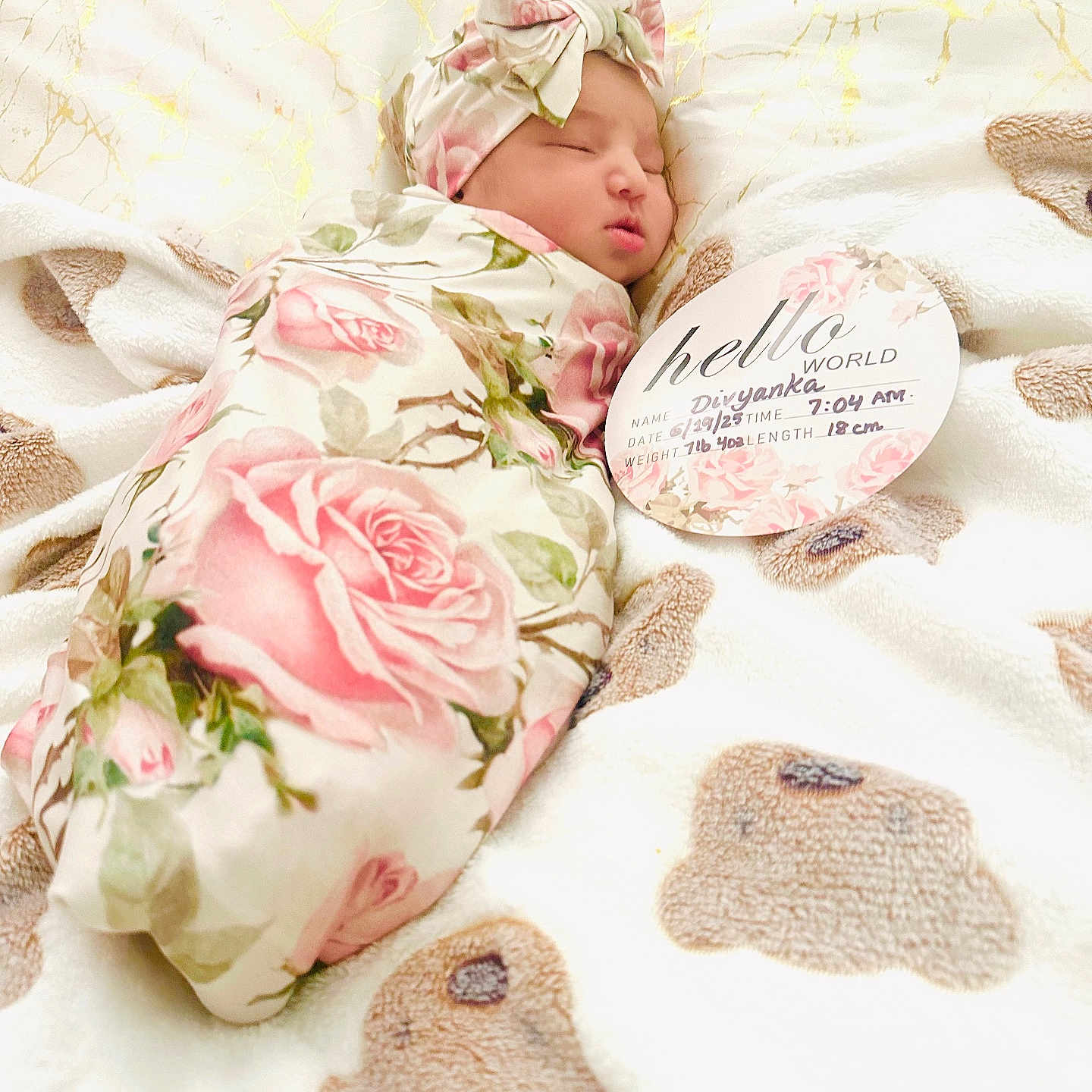 Divyanka is registered to the contest to win money with this photo: announcement, baby, blanket, closeup, cozy, cute, floral, headwrap, infant, newborn, peaceful, pink, portrait, resting, sign, sleeping, soft_texture, teddy_bear, white, wrapped