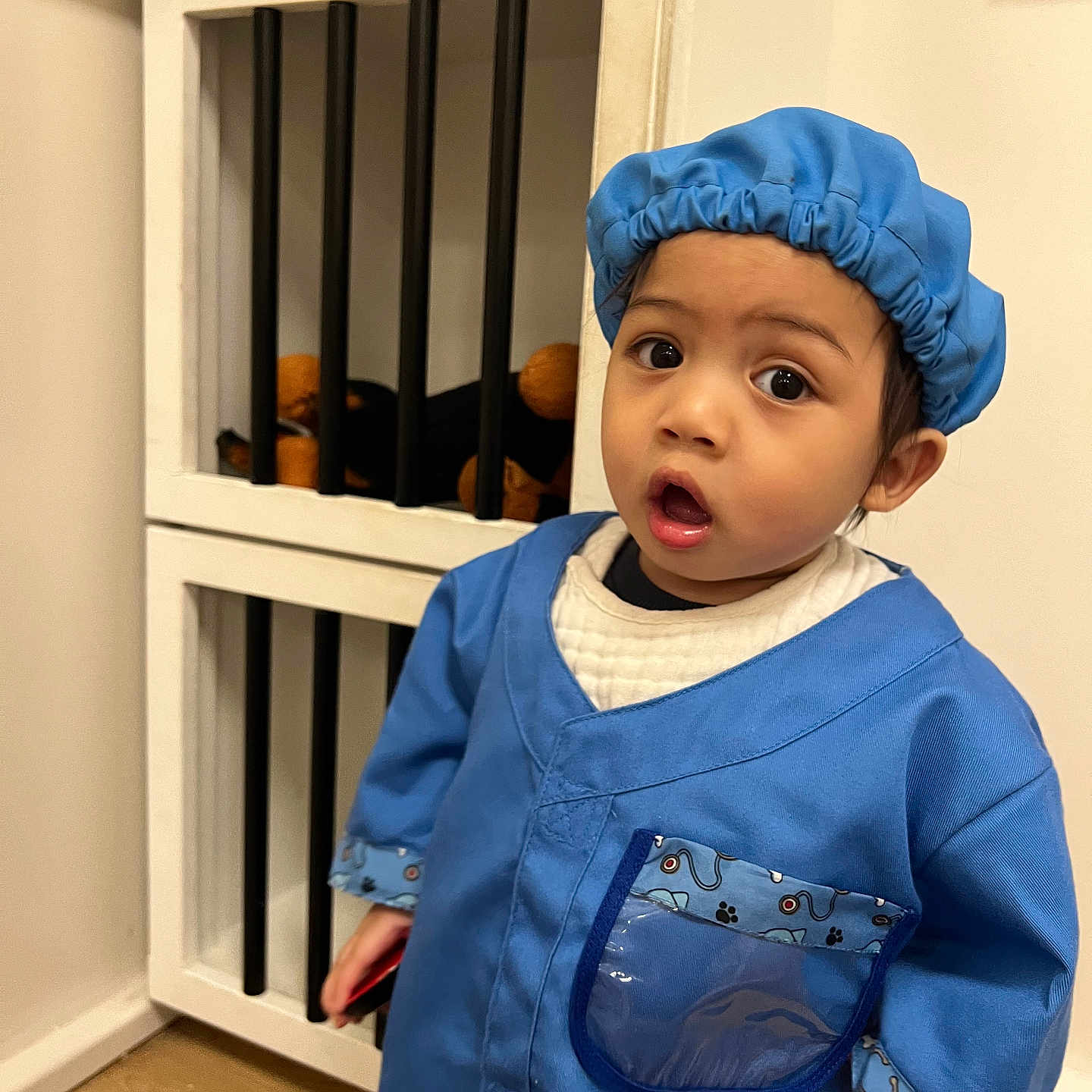 Zjan joined the competition — help win amazing prizes! baby, bonnet, bookcase, cap, clothing, coat, face, furniture, hardwood, hat, head, longsleeve, pants, person, photography, plywood, portrait, shelf, sleeve, wood