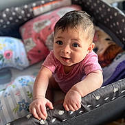Makayla joined the competition — help win amazing prizes! adorable, baby, blanket, bokeh, crib, cute, eyes, hands, indoor, infant, nursery, onesie, pillow, pink_clothing, playful, playpen, polka_dot, portrait, shallow_depth_of_field, smile