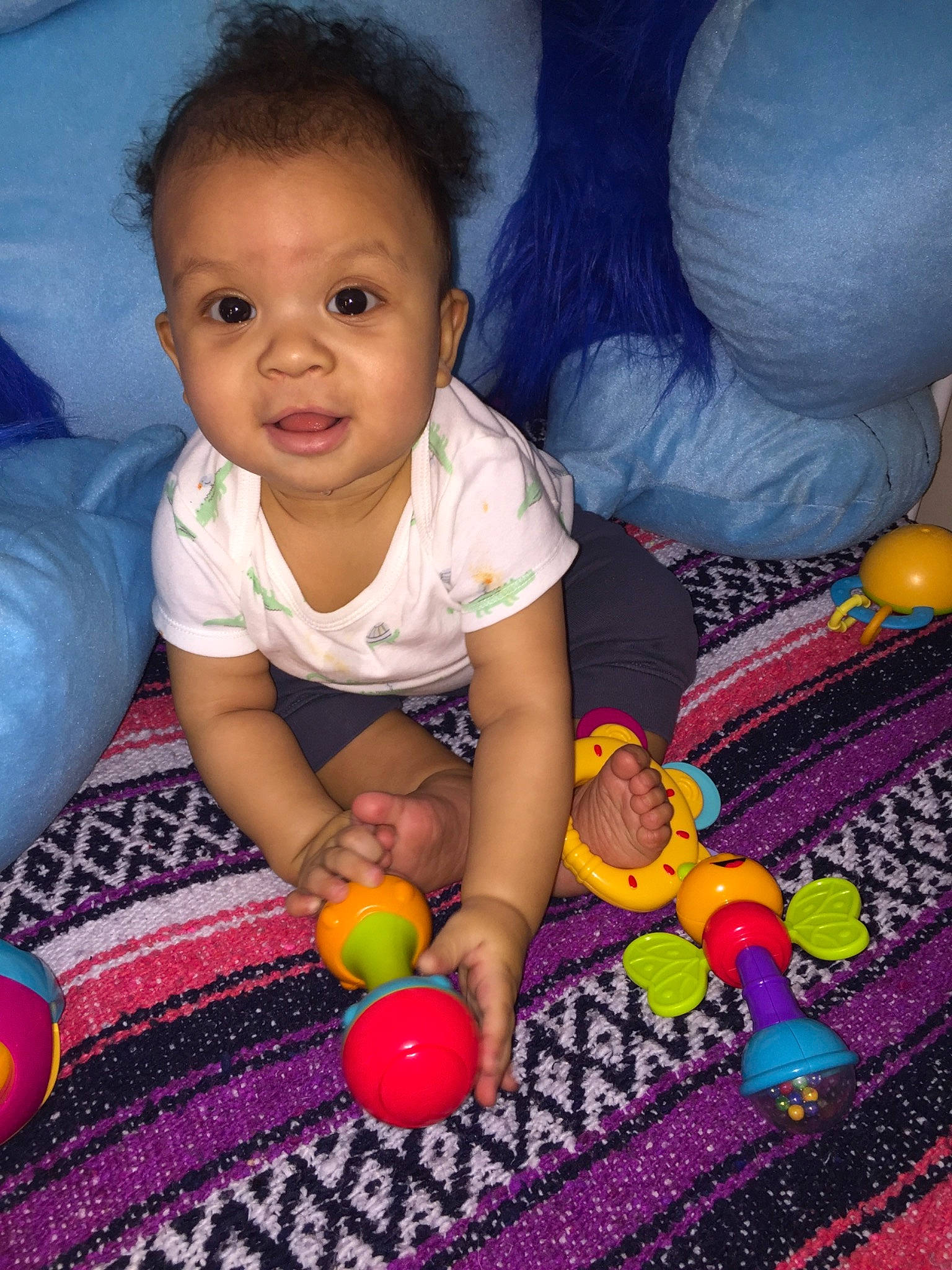 Isaias is registered to the contest to win money with this photo: baby, baby_toys, child, person, play, smile, toddler, toy