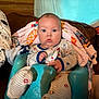 Bailey joined the competition — help win amazing prizes! baby, bed, blanket, bodypart, chair, couch, crib, cushion, face, finger, furniture, hand, head, homedecor, infantbed, newborn, person, photography, portrait, sitting