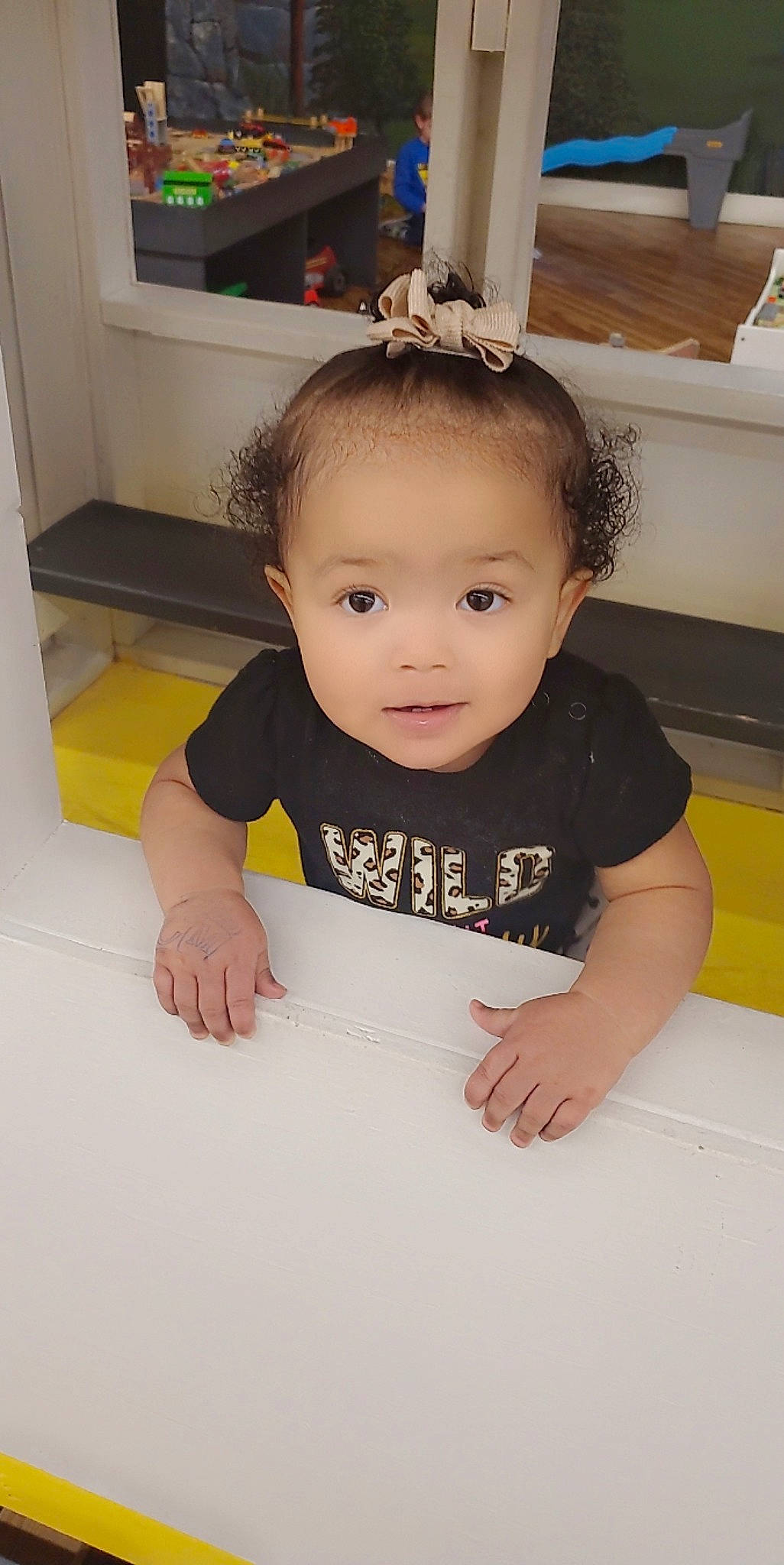 Kiana joined the competition — help win amazing prizes! baby, baby_toddler_clothing, cheek, child, eyebrow, finger, floor, flooring, fun, hair, hairstyle, happy, home_appliance, person, picture_frame, room, skin, sleeve, t_shirt, television