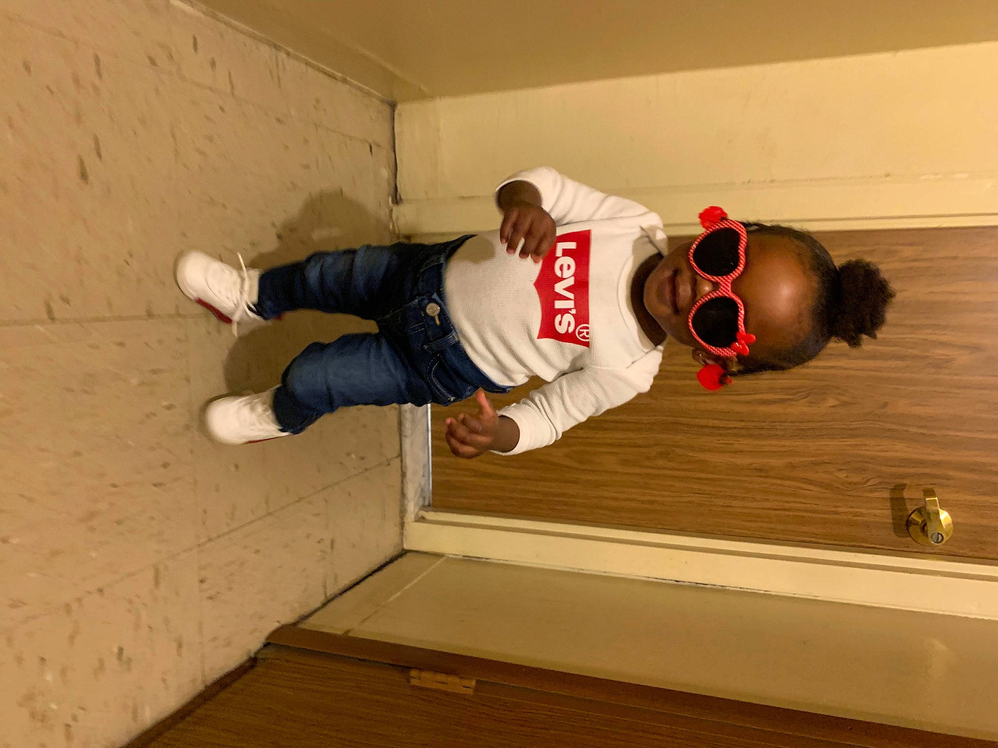 Regina joined the competition — help win amazing prizes! ceiling, comfort, concrete, elbow, floor, flooring, goggles, hardwood, outdoor_shoe, person, plywood, recreation, sneakers, sunglasses, t_shirt, varnish, walking_shoe, wall, wood, wood_flooring