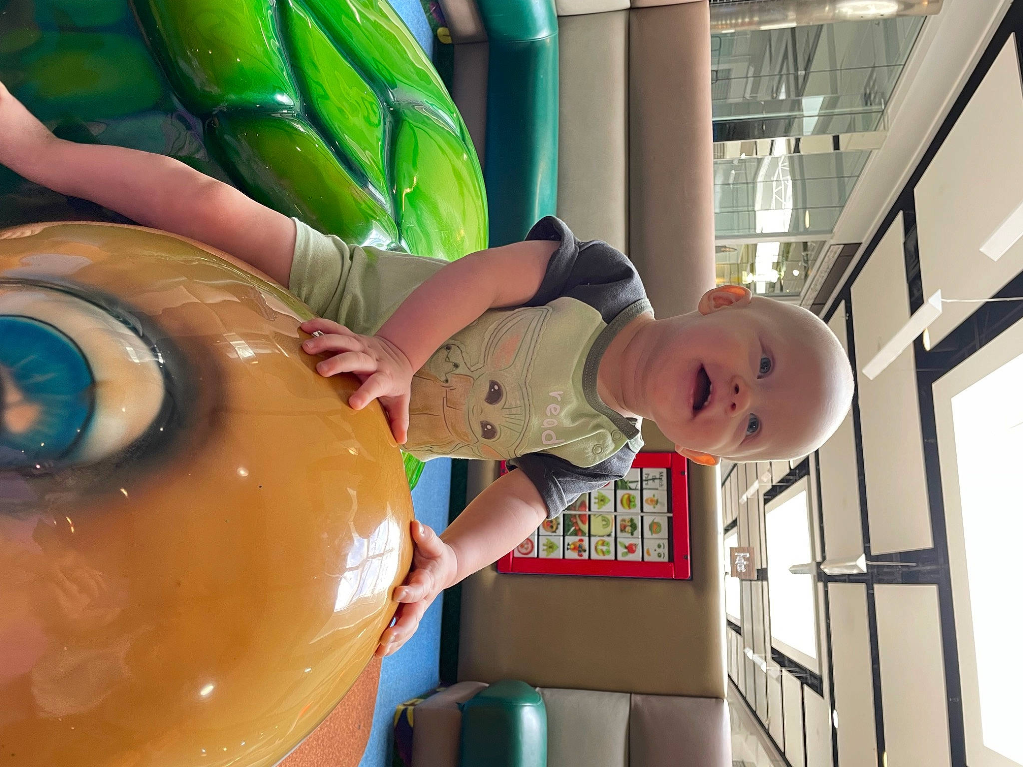 Austin is registered to the contest to win money with this photo: animation, baby, building, child, eye, fun, hat, human_body, leisure, person, recreation, room, smile, toddler, vacation, visual_arts