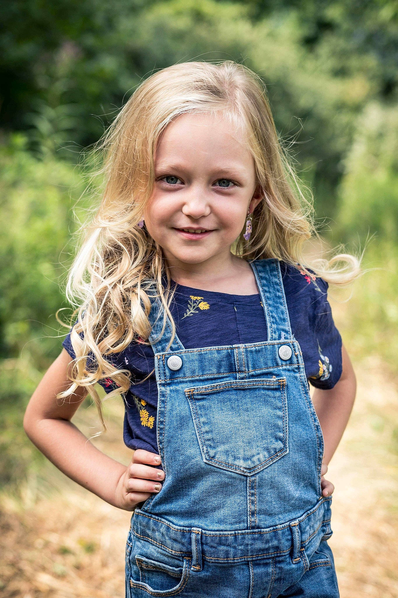 Legend is registered to the contest to win money with this photo: belt, blond, brown_hair, button, child_model, clothing, day_dress, denim, happy, iris, jeans, joy, long_hair, organ, overall, people_in_nature, person, pocket, portrait_photography, summer