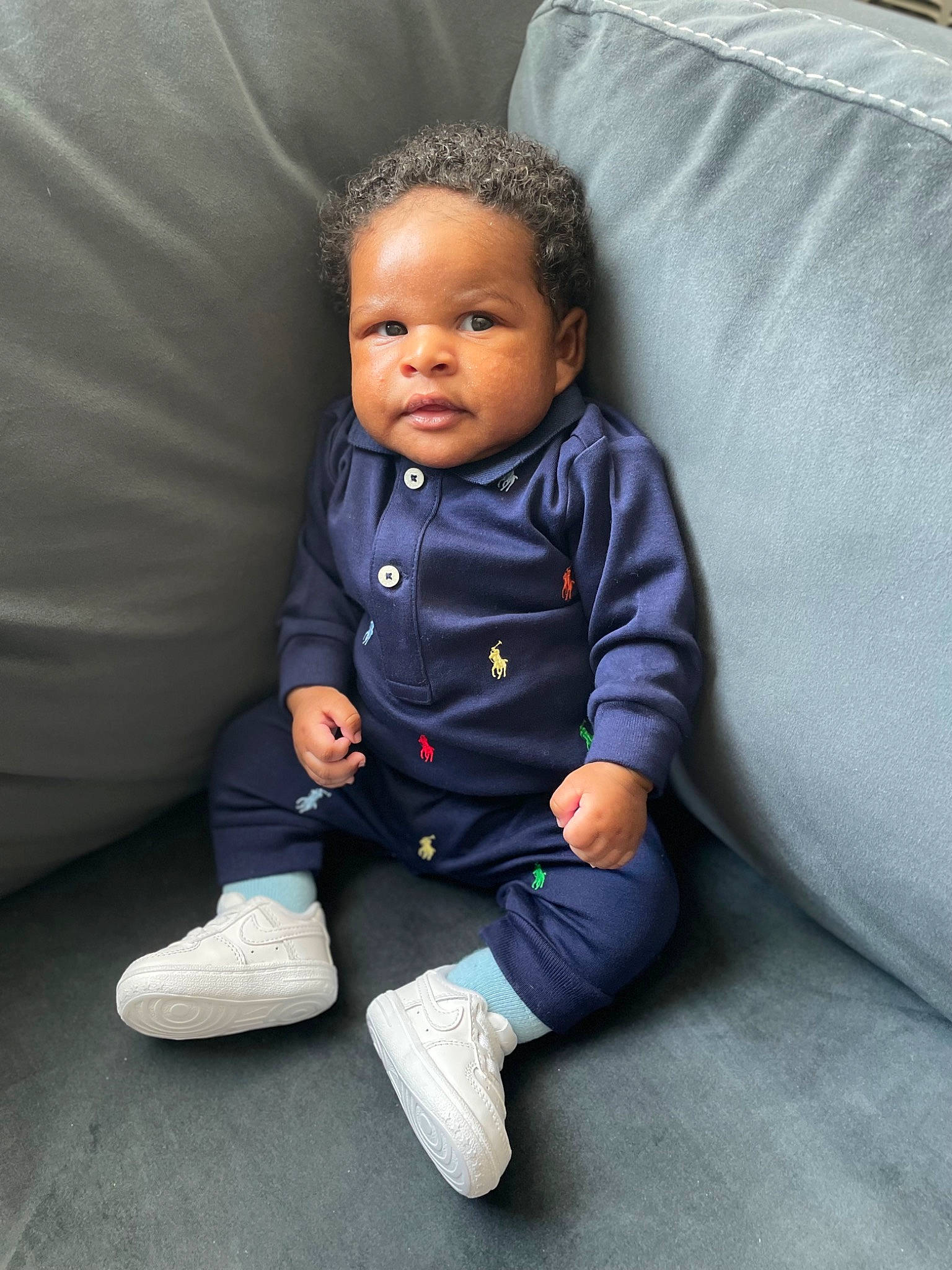 Azarias joined the competition — help win amazing prizes! baby, baby_toddler_clothing, cheek, child, comfort, couch, electric_blue, eye, face, flash_photography, flooring, foot, fun, head, linens, person, room, sitting, sleeve, smile