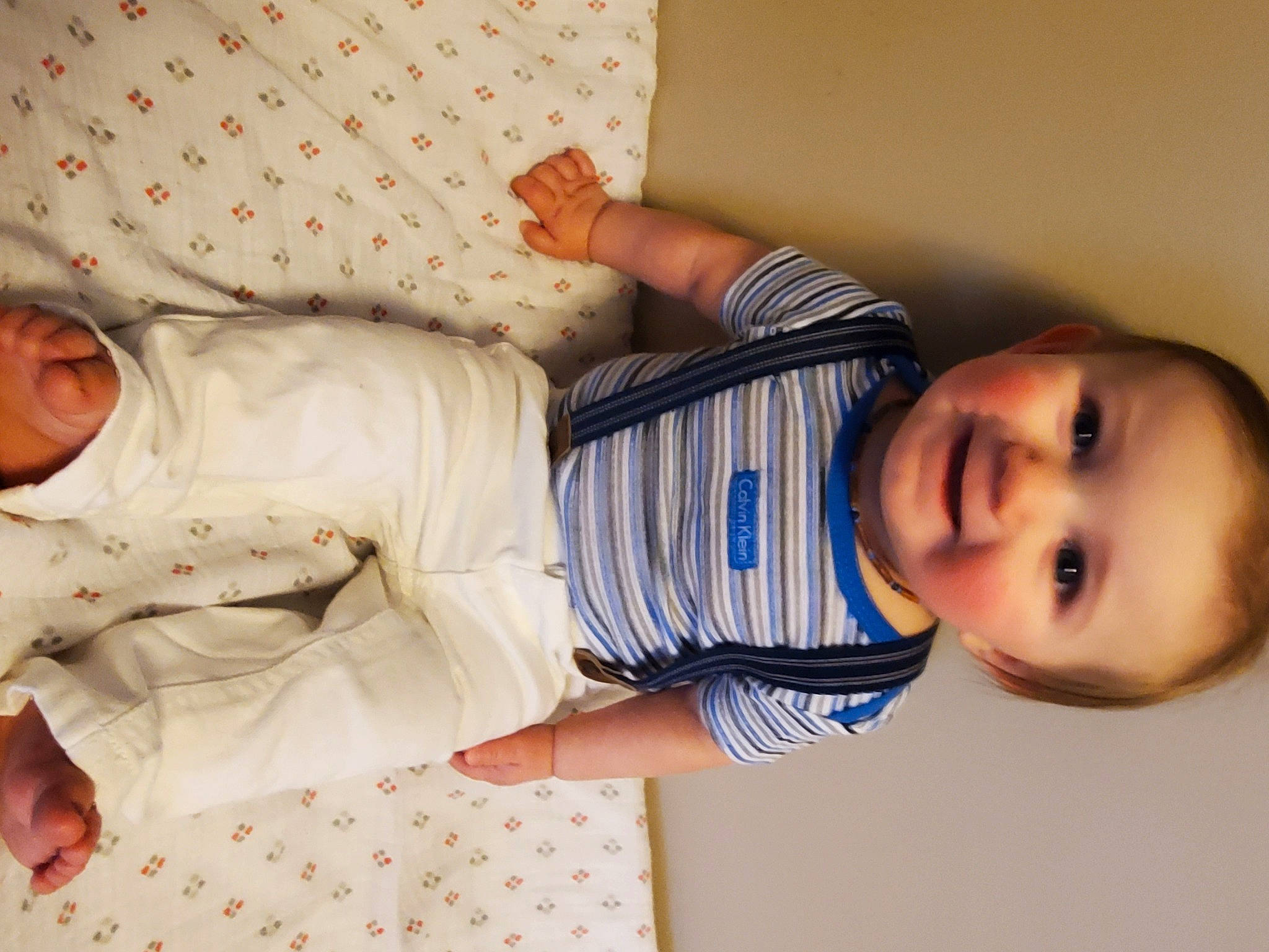 Jayce is registered to the contest to win money with this photo: arm, baby, baby_sleeping, baby_toddler_clothing, beauty, child, comfort, facial_expression, finger, hand, head, human_body, people, person, product, skin, sleeve, smile, textile, toddler