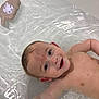 Dexter is registered to the contest to win money with this photo: arm, baby, bath, bathtub, child, childhood, clean, cute, face, floating, happy, head, indoors, infant, playful, relaxing, skin, smile, toy, water