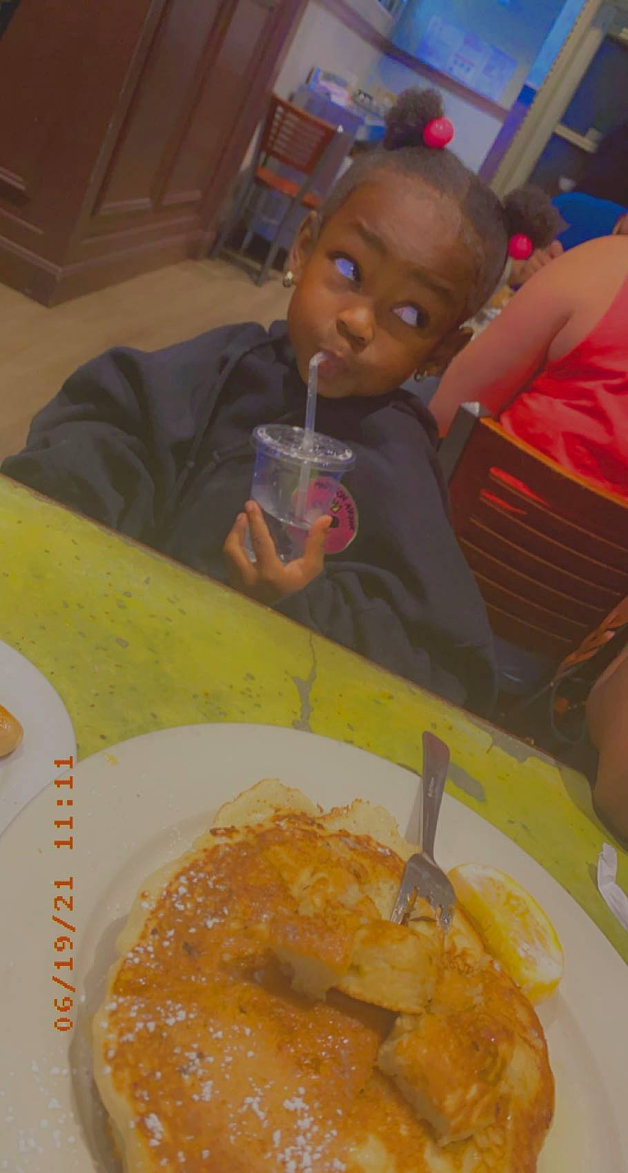 Madyson is registered to the contest to win money with this photo: chair, child, comfort_food, cuisine, curry, dish, fast_food, food, fork, ingredient, omelette, person, plate, produce, recipe, sharing, staple_food, table, tableware, toddler