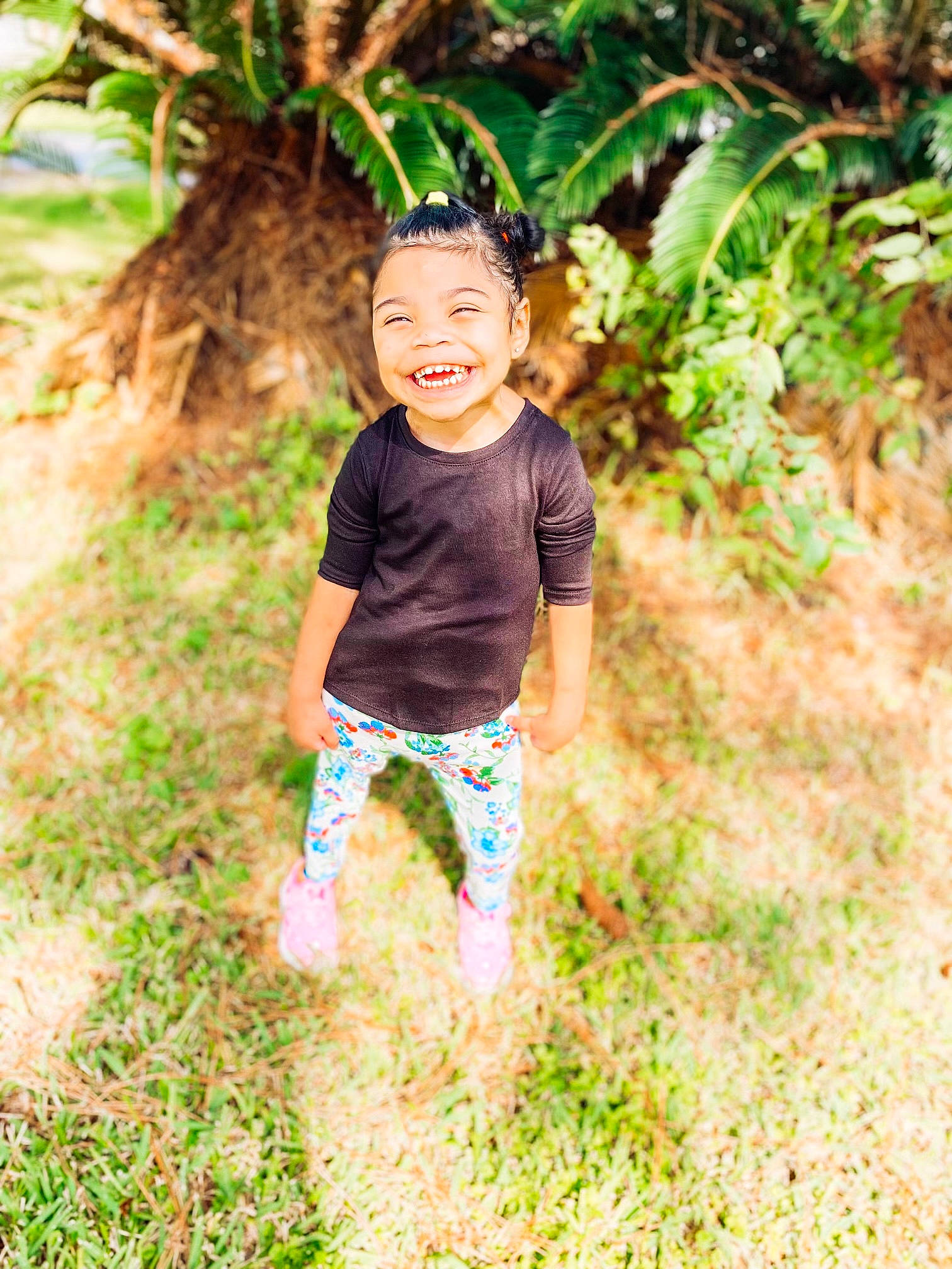 Genevieve joined the competition — help win amazing prizes! baby_toddler_clothing, child, forest, fun, grass, grass_family, happy, joy, jungle, landscape, leisure, people_in_nature, person, plant, play, shorts, smile, soil, t_shirt, terrestrial_plant